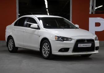 Подержанный автомобиль Mitsubishi Lancer Sedan 2014 года (3 фото)