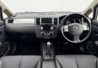 Подержанный автомобиль Nissan Tiida Hatchback 2006 года (12 фото)