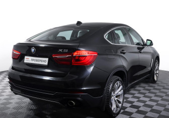Подержанный автомобиль BMW X6 2016 года (5 фото)