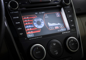 Подержанный автомобиль Mazda CX-7 2010 года (18 фото)