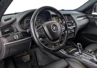 Подержанный автомобиль BMW X4 2015 года (15 фото)