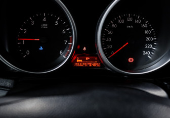 Подержанный автомобиль Mazda 3 Hatchback 2009 года (11 фото)