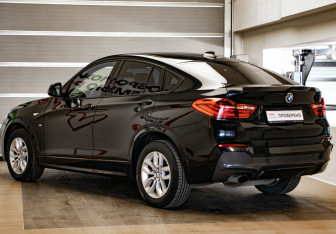 Подержанный автомобиль BMW X4 2015 года (6 фото)