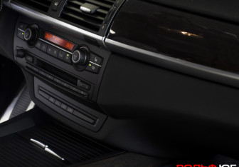 Подержанный автомобиль BMW X5 2010 года (19 фото)