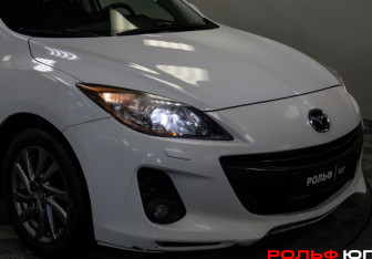 Подержанный автомобиль Mazda 3 Hatchback 2012 года (16 фото)