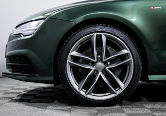 Подержанный автомобиль Audi A7 2016 года (15 фото)