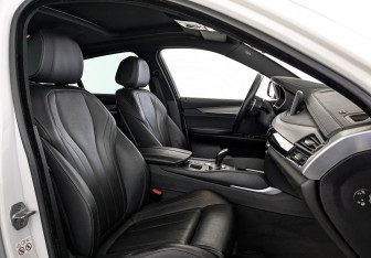 Подержанный автомобиль BMW X6 2018 года (24 фото)