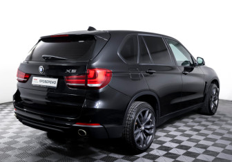Подержанный автомобиль BMW X5 2014 года (5 фото)