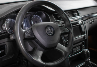 Подержанный автомобиль Skoda Superb Liftback 2014 года (13 фото)