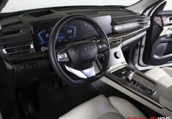 Подержанный автомобиль Exeed VX 2023 года (9 фото)