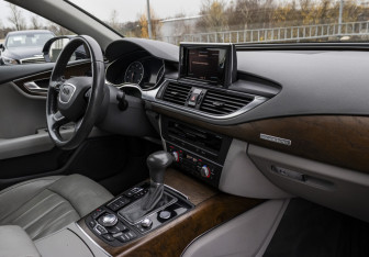 Подержанный автомобиль Audi A7 2010 года (9 фото)