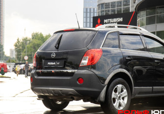 Подержанный автомобиль Opel Antara 2013 года (13 фото)