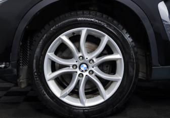 Подержанный автомобиль BMW X6 2015 года (19 фото)