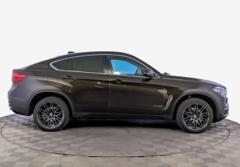 Подержанный автомобиль BMW X6 2016 года (4 фото)