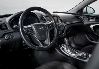Подержанный автомобиль Opel Insignia Wagon 2015 года (14 фото)