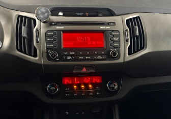 Подержанный автомобиль Kia Sportage 2014 года (14 фото)
