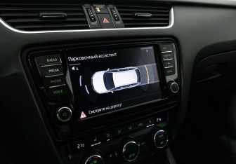 Подержанный автомобиль Skoda Octavia Wagon 2015 года (11 фото)