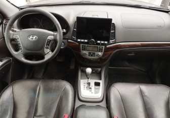 Подержанный автомобиль Hyundai Santa Fe 2011 года (9 фото)