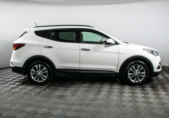 Подержанный автомобиль Hyundai Santa Fe 2015 года (4 фото)