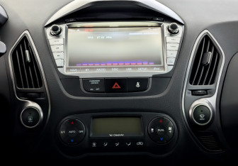 Подержанный автомобиль Hyundai ix35 2014 года (15 фото)