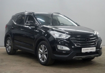 Подержанный автомобиль Hyundai Santa Fe 2015 года (3 фото)