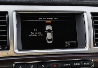 Подержанный автомобиль Jaguar XF Sedan 2014 года (20 фото)