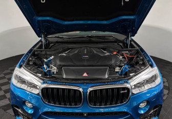 Подержанный автомобиль BMW X6 M 2016 года (10 фото)