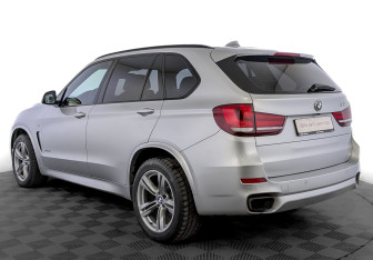 Подержанный автомобиль BMW X5 2014 года (7 фото)