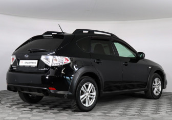Подержанный автомобиль Subaru Impreza Hatchback 2010 года (5 фото)