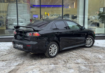 Подержанный автомобиль Mitsubishi Lancer Sedan 2012 года (8 фото)