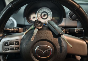 Подержанный автомобиль Mazda 2 Hatchback 2008 года (16 фото)