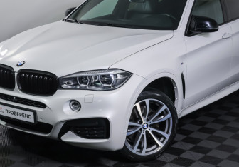 Подержанный автомобиль BMW X6 2016 года (24 фото)