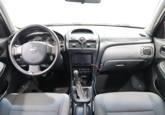 Подержанный автомобиль Nissan Almera Classic 2007 года (13 фото)