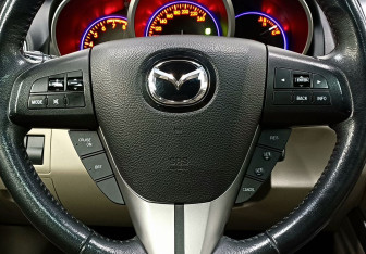 Подержанный автомобиль Mazda CX-7 2011 года (13 фото)