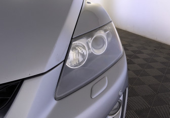 Подержанный автомобиль Mazda CX-7 2011 года (11 фото)