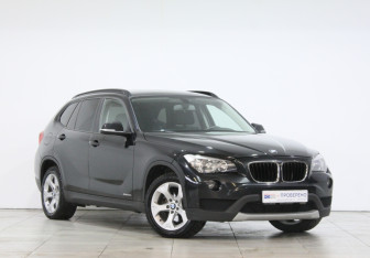 Подержанный автомобиль BMW X1 2013 года (2 фото)