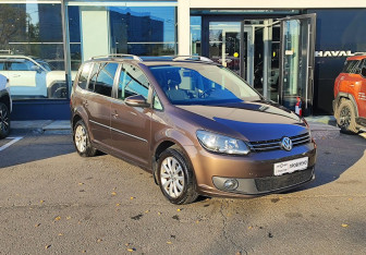 Подержанный автомобиль Volkswagen Touran 2012 года (3 фото)