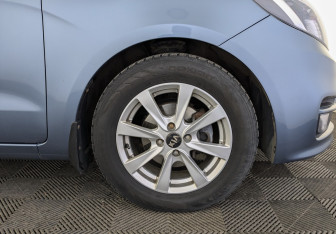 Подержанный автомобиль Kia Rio Sedan 2015 года (18 фото)