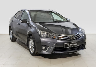 Подержанный автомобиль Toyota Corolla Sedan 2014 года (3 фото)