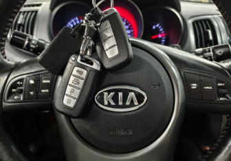 Подержанный автомобиль Kia Cerato Coupe 2011 года (18 фото)