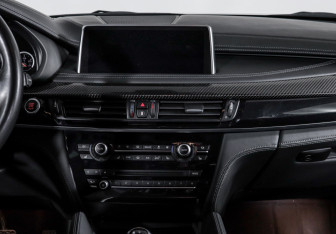 Подержанный автомобиль BMW X6 M 2015 года (13 фото)