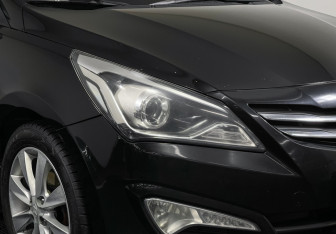 Подержанный автомобиль Hyundai Solaris Hatchback 2015 года (16 фото)