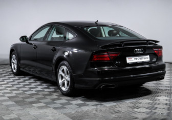 Подержанный автомобиль Audi A7 2015 года (7 фото)