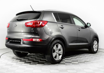 Подержанный автомобиль Kia Sportage 2012 года (5 фото)
