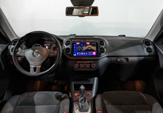 Подержанный автомобиль Volkswagen Tiguan 2014 года (14 фото)