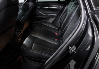 Подержанный автомобиль BMW X6 M 2015 года (10 фото)