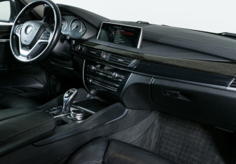 Подержанный автомобиль BMW X6 2015 года (11 фото)