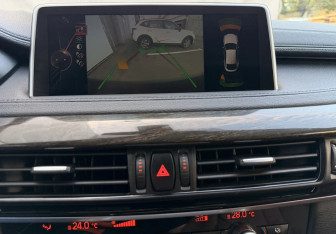 Подержанный автомобиль BMW X6 2015 года (15 фото)