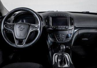 Подержанный автомобиль Opel Insignia Wagon 2015 года (12 фото)