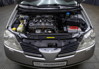 Подержанный автомобиль Nissan Primera Sedan 2003 года (9 фото)